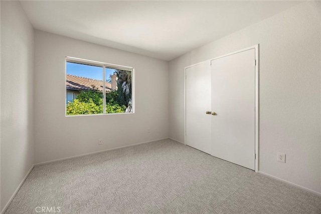 13639 Meadow Crest Dr, Chino Hills, CA 91709 - unfurnished bedroom featuring carpet floors, baseboards, and a closet
