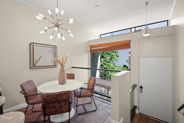 500 E Del Mar Blvd Unit 24, Pasadena, CA 91101 - dining space featuring a chandelier, ornamental molding, healthy amount of natural light, and baseboards