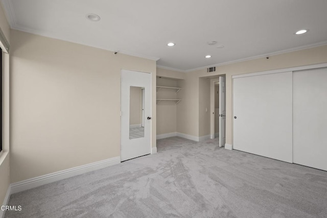 500 E Del Mar Blvd Unit 24, Pasadena, CA 91101 - unfurnished bedroom featuring multiple closets, ornamental molding, recessed lighting, carpet flooring, and baseboards