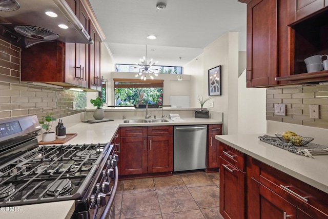 500 E Del Mar Blvd Unit 24, Pasadena, CA 91101 - kitchen featuring stainless steel appliances, a sink, dark brown cabinets, extractor fan, and a chandelier