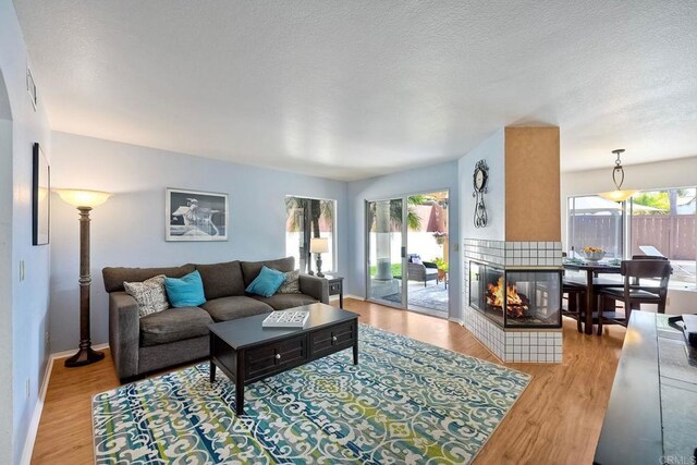 3737 Hillview Way, Oceanside, CA 92056 - living area featuring wood finished floors and baseboards