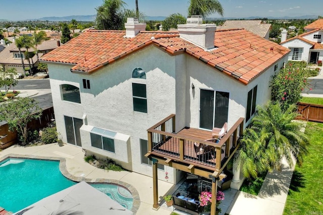 3737 Hillview Way, Oceanside, CA 92056 - back of property featuring stucco siding, a tile roof, a patio area, and fence