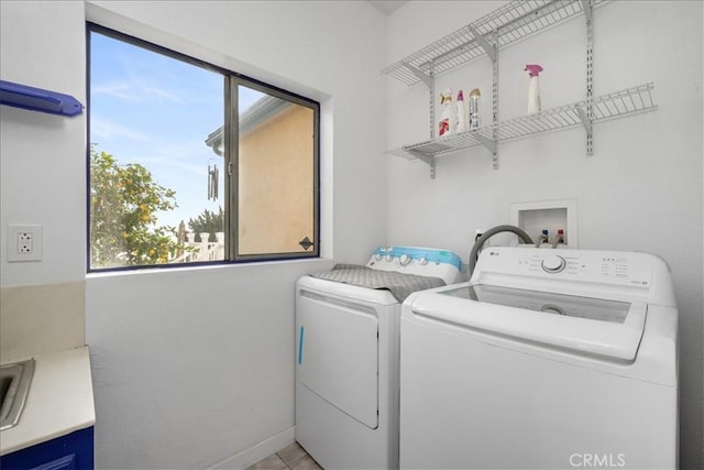 1561 Cielo Ln, Nipomo, CA 93444 - clothes washing area featuring washing machine and clothes dryer and baseboards