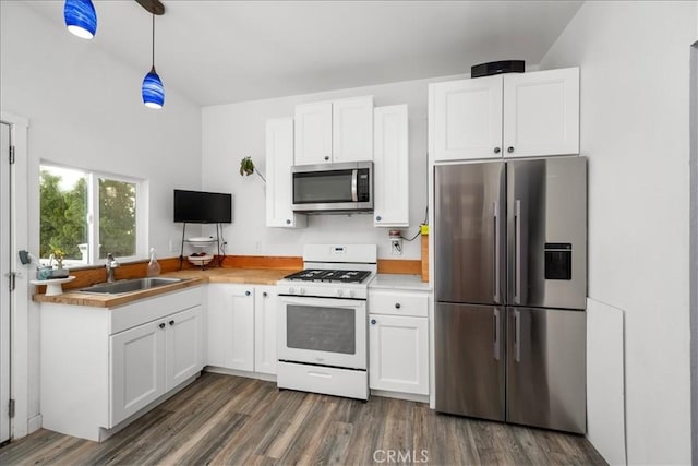 1561 Cielo Ln, Nipomo, CA 93444 - kitchen featuring appliances with stainless steel finishes, a sink, white cabinets, and dark wood-style flooring