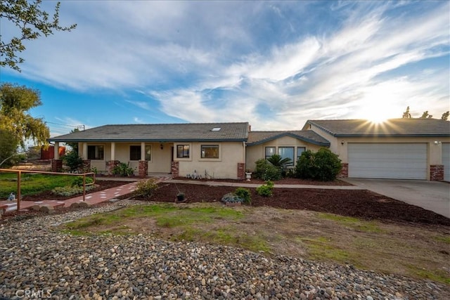 1561 Cielo Ln, Nipomo, CA 93444 - single story home featuring concrete driveway, a garage, stucco siding, and a porch