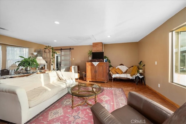 1561 Cielo Ln, Nipomo, CA 93444 - living room with a barn door, plenty of natural light, recessed lighting, and baseboards