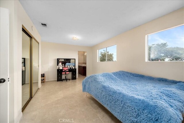 1561 Cielo Ln, Nipomo, CA 93444 - bedroom featuring a desk and ensuite bath