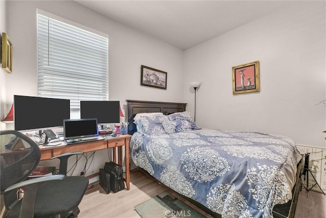 1952 Hazel Olson Ln, Colton, CA 92324 - bedroom featuring wood finished floors and a desk