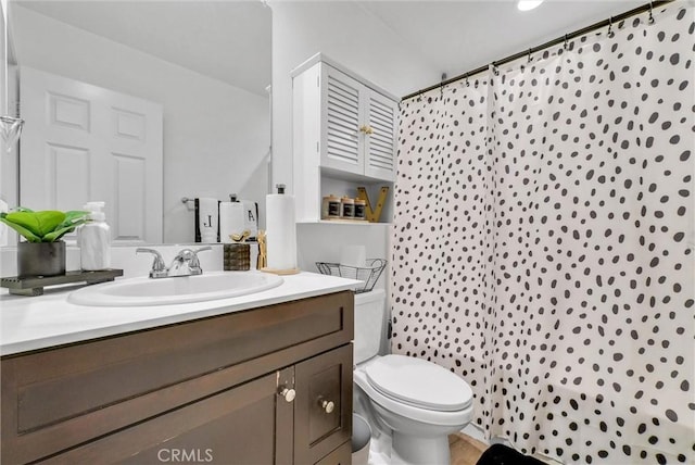 1952 Hazel Olson Ln, Colton, CA 92324 - full bathroom with vanity, toilet, and curtained shower