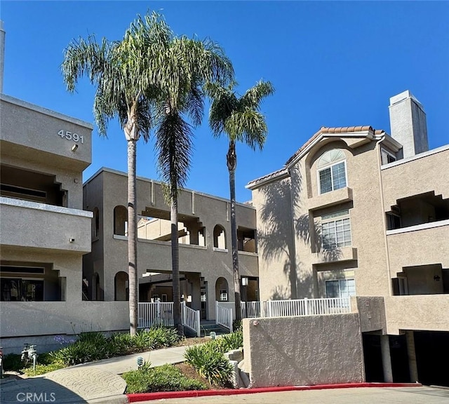 4591 Warner Ave Unit 105, Huntington Beach, CA 92649 - view of apartment building / complex