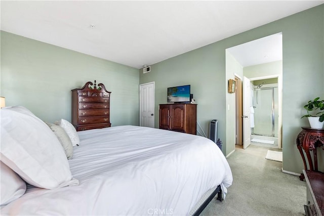 4591 Warner Ave Unit 105, Huntington Beach, CA 92649 - carpeted bedroom with baseboards, ensuite bath, and a closet