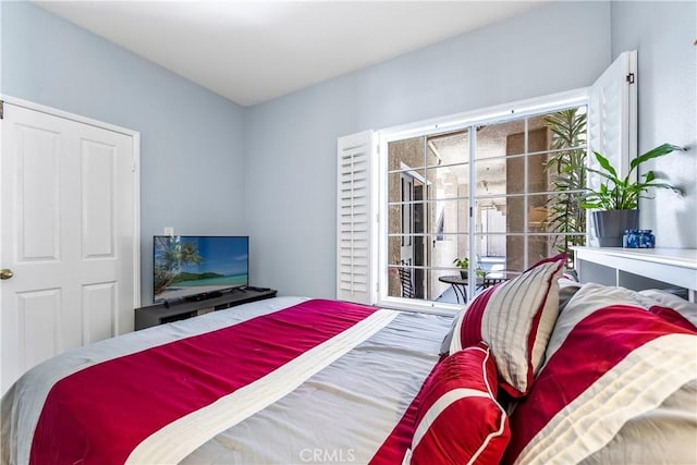 4591 Warner Ave Unit 105, Huntington Beach, CA 92649 - bedroom featuring access to outside