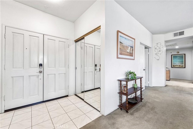 4591 Warner Ave Unit 105, Huntington Beach, CA 92649 - entryway with light colored carpet