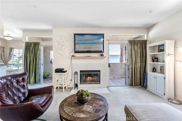 4591 Warner Ave Unit 105, Huntington Beach, CA 92649 - carpeted living area with a fireplace