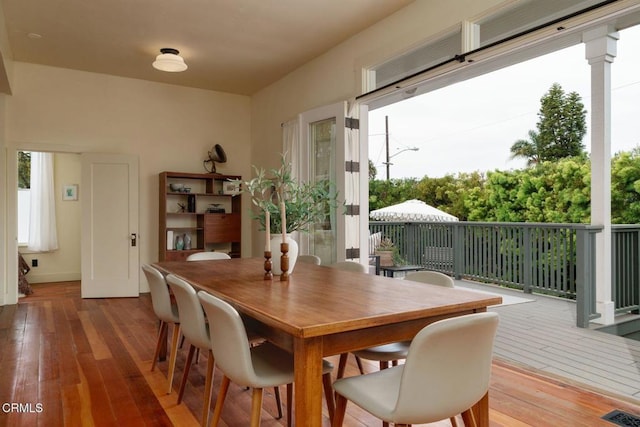 399 W Center St, Ventura, CA 93001 - dining area featuring hardwood / wood-style flooring, healthy amount of natural light, and baseboards