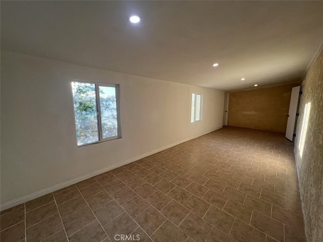 1754 Fortuna Ave, Landers, CA 92285 - below grade area with plenty of natural light, recessed lighting, and baseboards