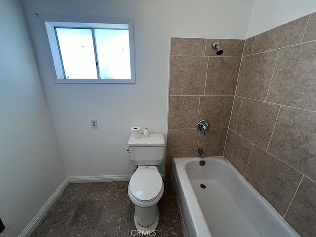 1754 Fortuna Ave, Landers, CA 92285 - bathroom featuring toilet, baseboards, and shower / bathtub combination