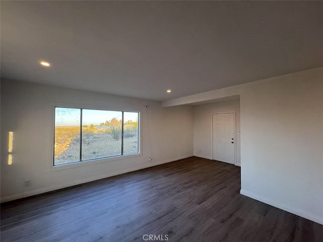 1754 Fortuna Ave, Landers, CA 92285 - empty room featuring dark wood-style floors, recessed lighting, and baseboards