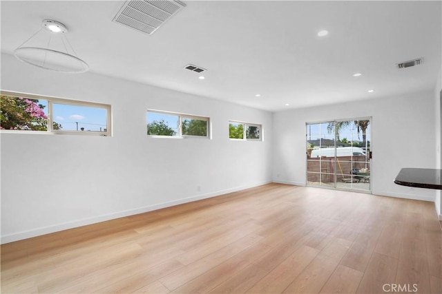 8331 Sharp Ave, Sun Valley, CA 91352 - unfurnished room featuring light wood-style floors, baseboards, and recessed lighting