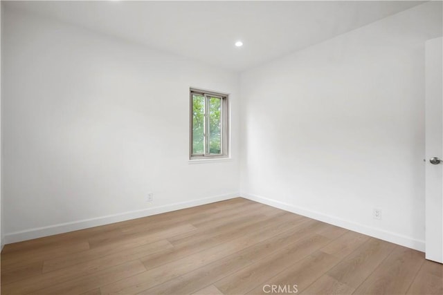 8331 Sharp Ave, Sun Valley, CA 91352 - unfurnished room with light wood finished floors, baseboards, and recessed lighting