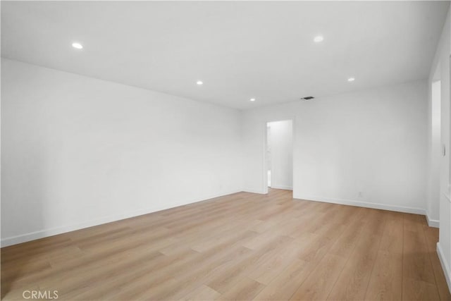 8331 Sharp Ave, Sun Valley, CA 91352 - spare room with light wood-style floors, recessed lighting, and baseboards