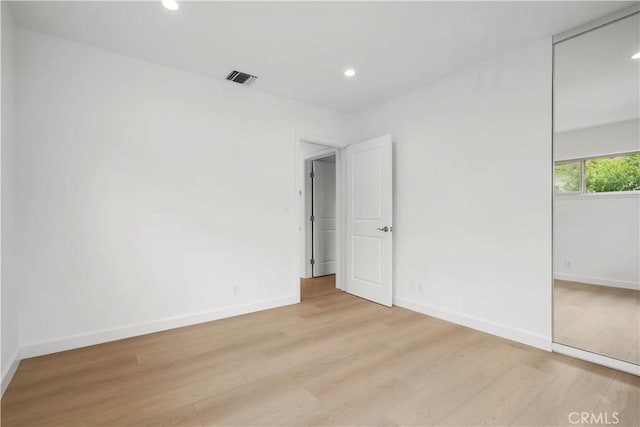 8331 Sharp Ave, Sun Valley, CA 91352 - unfurnished bedroom featuring light wood-type flooring, recessed lighting, baseboards, and a closet
