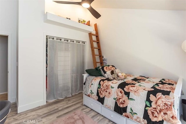 bedroom with wood finished floors and ceiling fan