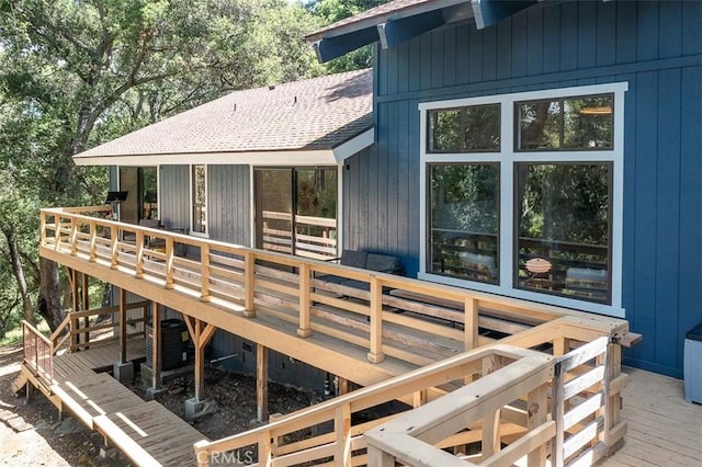 deck featuring central air condition unit