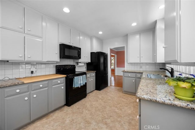 5422 E Harvey Way, Long Beach, CA 90808 - kitchen featuring black appliances, a sink, tasteful backsplash, and recessed lighting