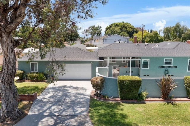 5422 E Harvey Way, Long Beach, CA 90808 - ranch-style home with a garage, stucco siding, driveway, and roof with shingles