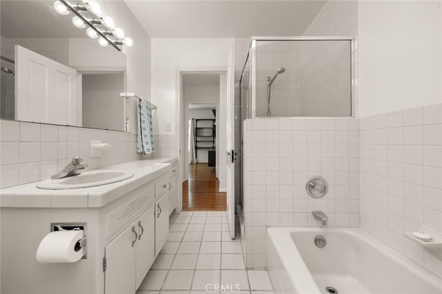 5422 E Harvey Way, Long Beach, CA 90808 - full bathroom with a tile shower, vanity, tile patterned floors, a bath, and tasteful backsplash