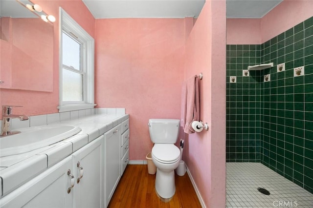5422 E Harvey Way, Long Beach, CA 90808 - full bath with vanity, wood finished floors, a tile shower, and toilet