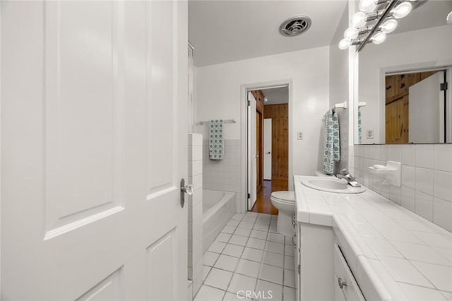 5422 E Harvey Way, Long Beach, CA 90808 - full bathroom with vanity, tile patterned floors, toilet, and backsplash