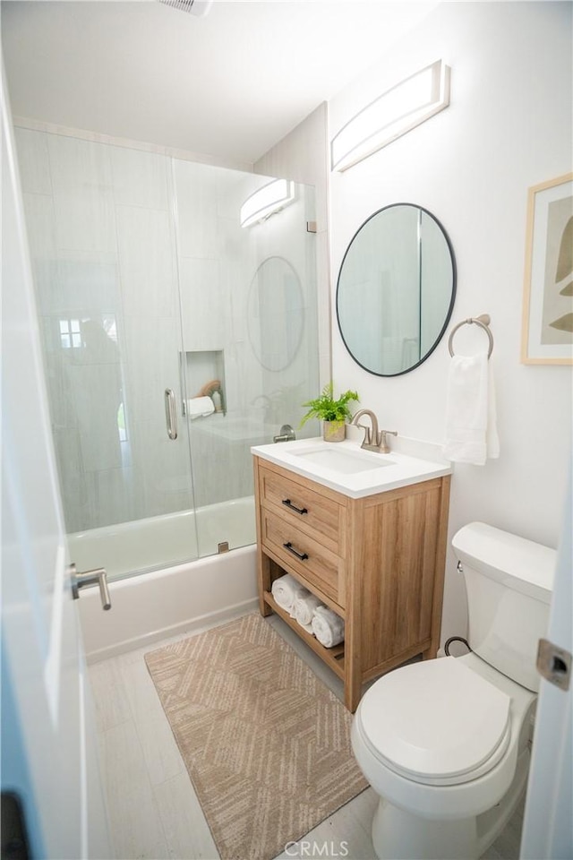 4110 E Vermont St, Long Beach, CA 90814 - full bathroom featuring toilet, enclosed tub / shower combo, and vanity