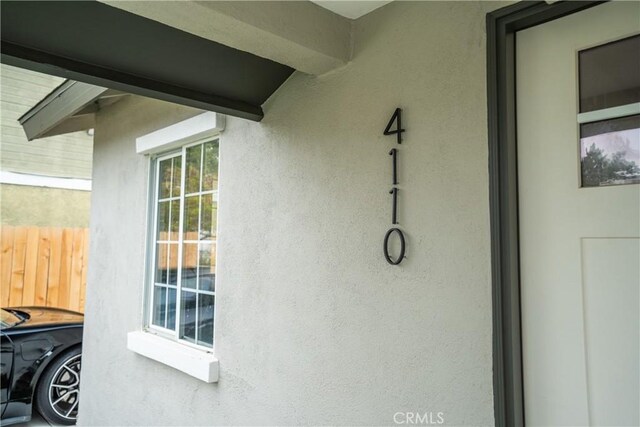 4110 E Vermont St, Long Beach, CA 90814 - exterior view of stucco siding and fence