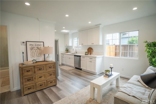 4110 E Vermont St, Long Beach, CA 90814 - living room featuring light wood-type flooring, recessed lighting, and baseboards