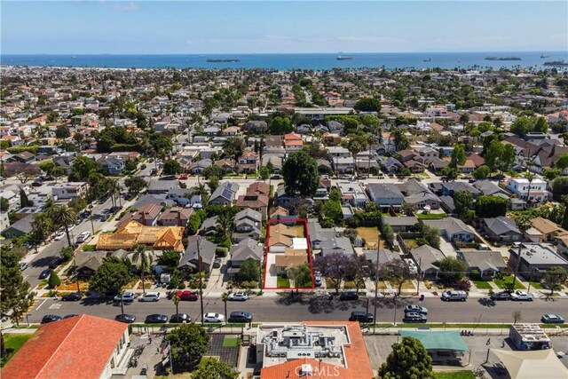 4110 E Vermont St, Long Beach, CA 90814 - aerial perspective of suburban area with property boundaries highlighted and a nearby body of water