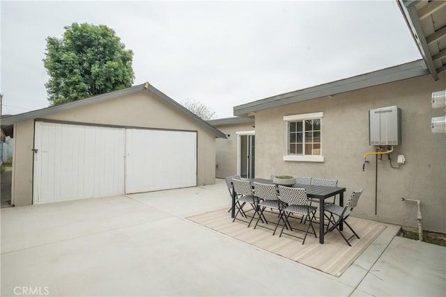 4110 E Vermont St, Long Beach, CA 90814 - view of patio featuring an outbuilding and outdoor dining area