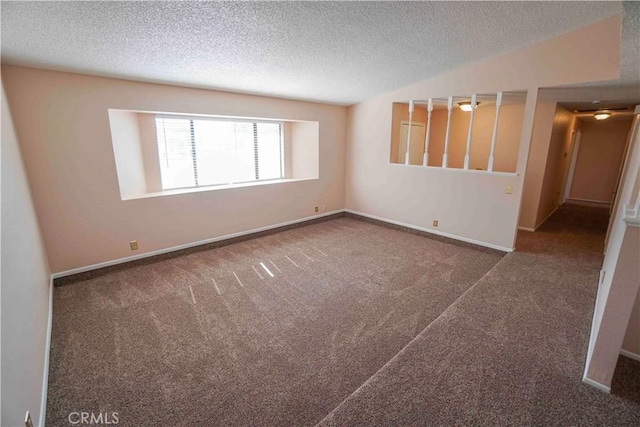 14410 Navajo Rd, Apple Valley, CA 92307 - unfurnished room featuring carpet, a textured ceiling, and baseboards