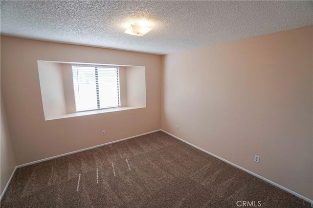 14410 Navajo Rd, Apple Valley, CA 92307 - carpeted spare room with baseboards and a textured ceiling