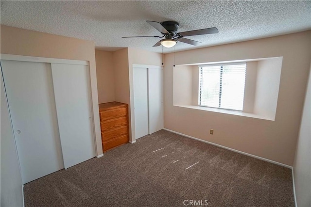 14410 Navajo Rd, Apple Valley, CA 92307 - unfurnished bedroom with carpet flooring, a textured ceiling, and ceiling fan