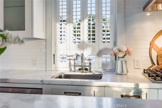 1651 Catalina, Laguna Beach, CA 92651 - kitchen view of a sink, decorative backsplash, light stone countertops, and gray cabinets