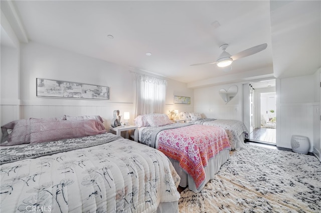1651 Catalina, Laguna Beach, CA 92651 - bedroom featuring multiple windows, wainscoting, wood finished floors, and a ceiling fan