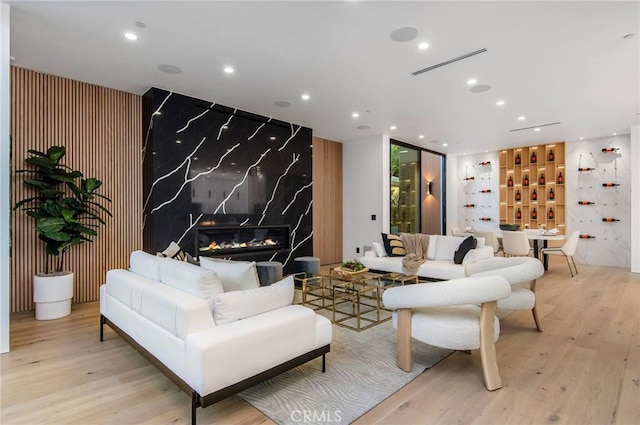 5132 Lindley Ave, Encino, CA 91316 - living room featuring light wood-type flooring and recessed lighting
