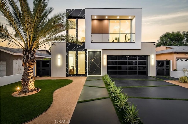 5132 Lindley Ave, Encino, CA 91316 - view of front of home featuring driveway and an attached garage