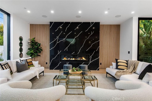 5132 Lindley Ave, Encino, CA 91316 - living room featuring an accent wall, recessed lighting, and wood finished floors