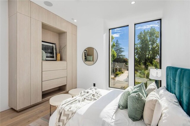 5132 Lindley Ave, Encino, CA 91316 - bedroom with light wood finished floors and recessed lighting