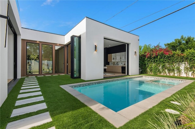 5132 Lindley Ave, Encino, CA 91316 - view of swimming pool featuring a lawn and a pool with connected hot tub