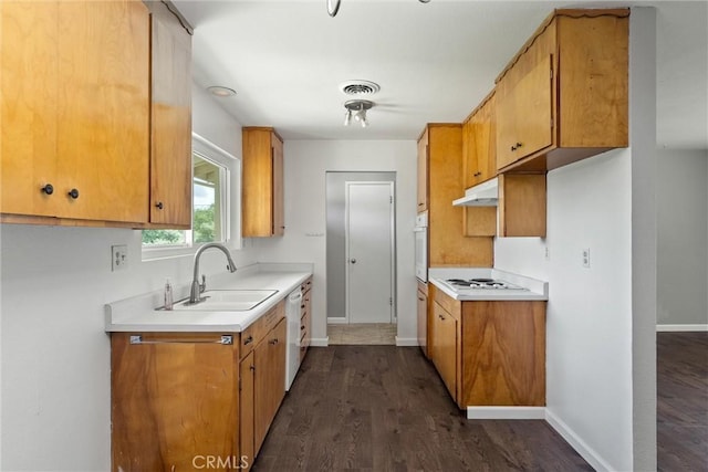 2880 Foothill Blvd, Oroville, CA 95966 - kitchen featuring a sink, white appliances, under cabinet range hood, and baseboards
