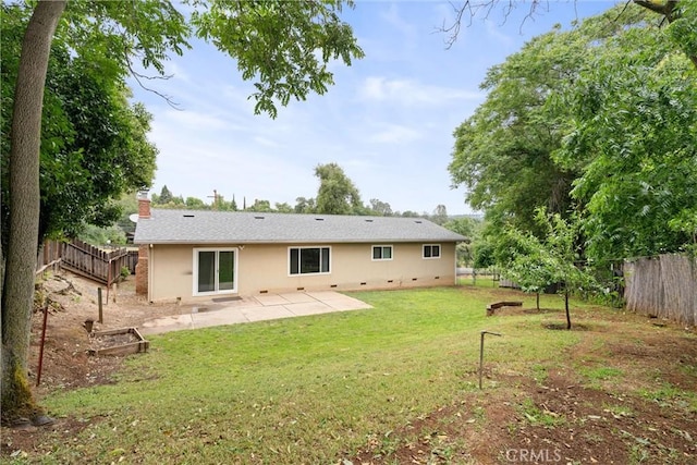 2880 Foothill Blvd, Oroville, CA 95966 - rear view of house with a patio area, a chimney, and stucco siding